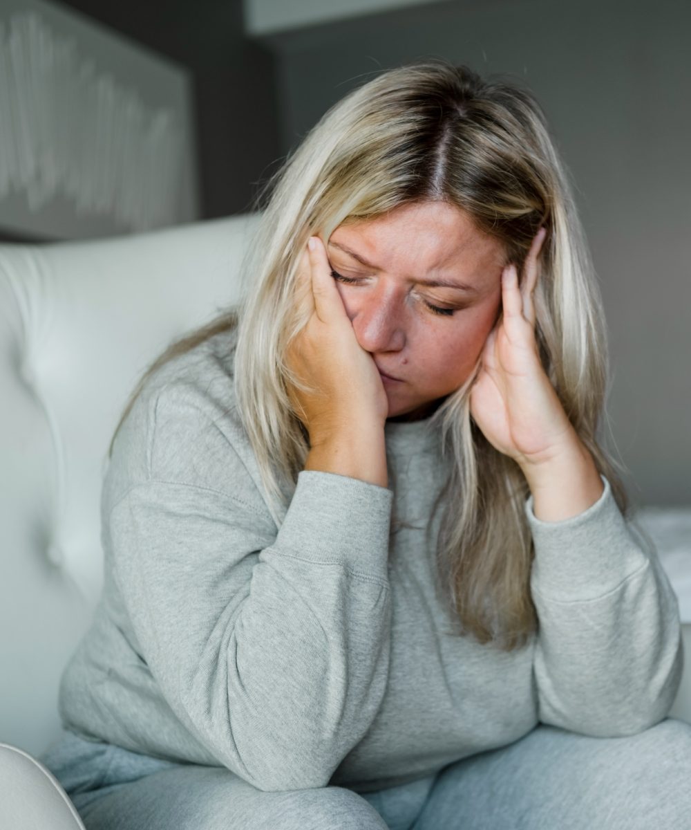 Unhappy woman thinking about health problems. Mental health overweight problems.